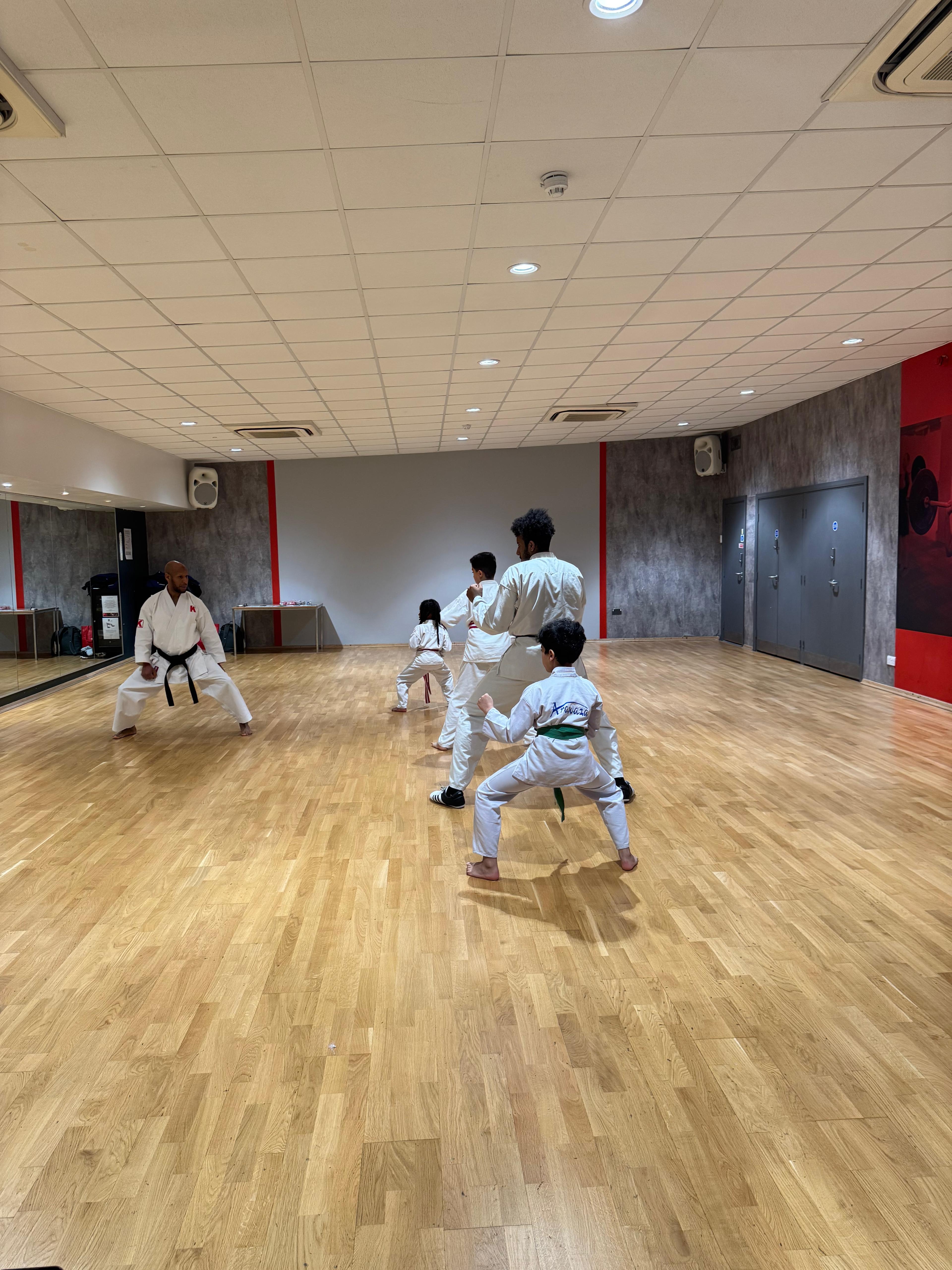 AN Shotokan Karate grading day ceremony with students receiving belts