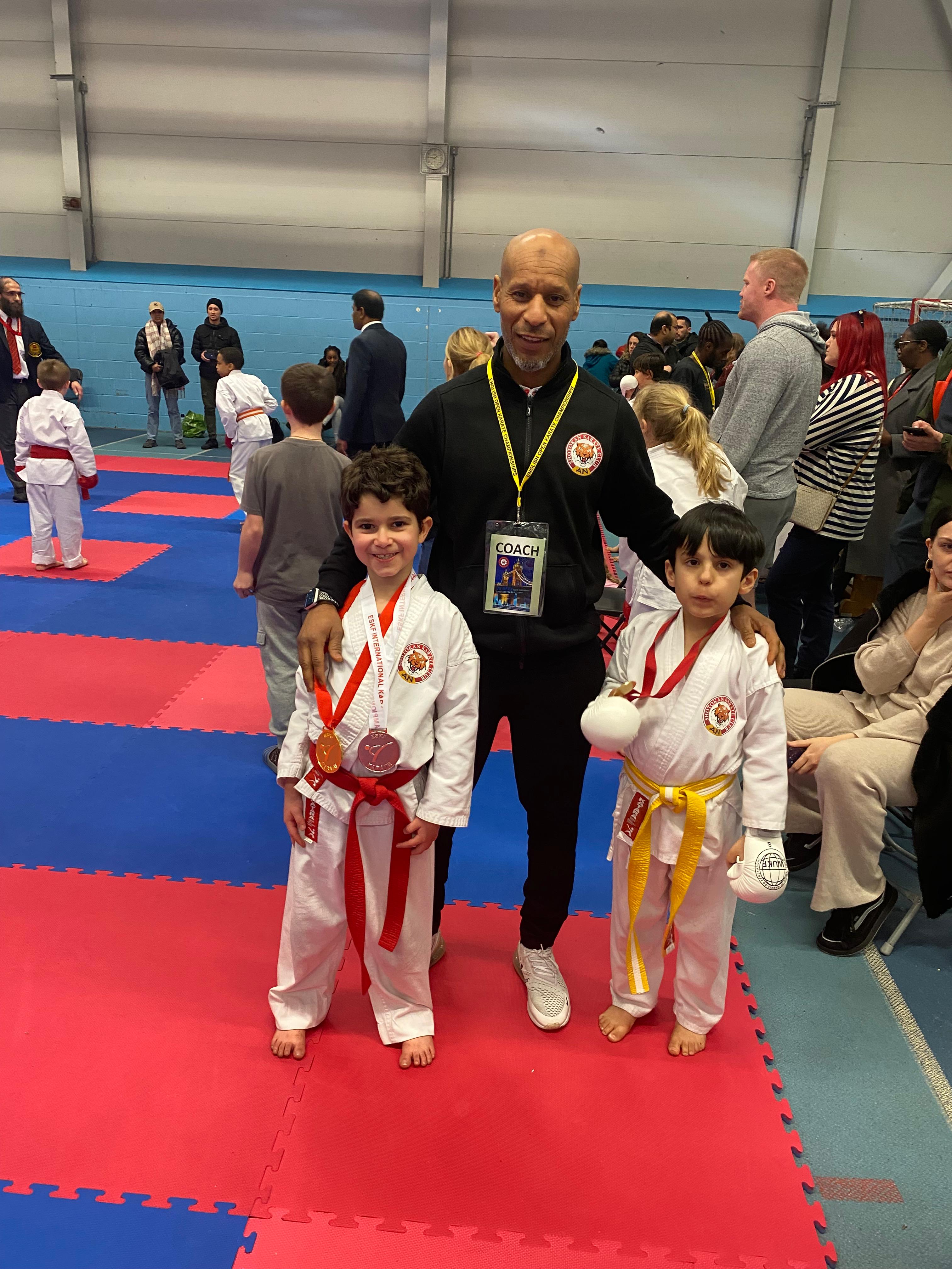 AN Shotokan Karate grading day ceremony with students receiving belts