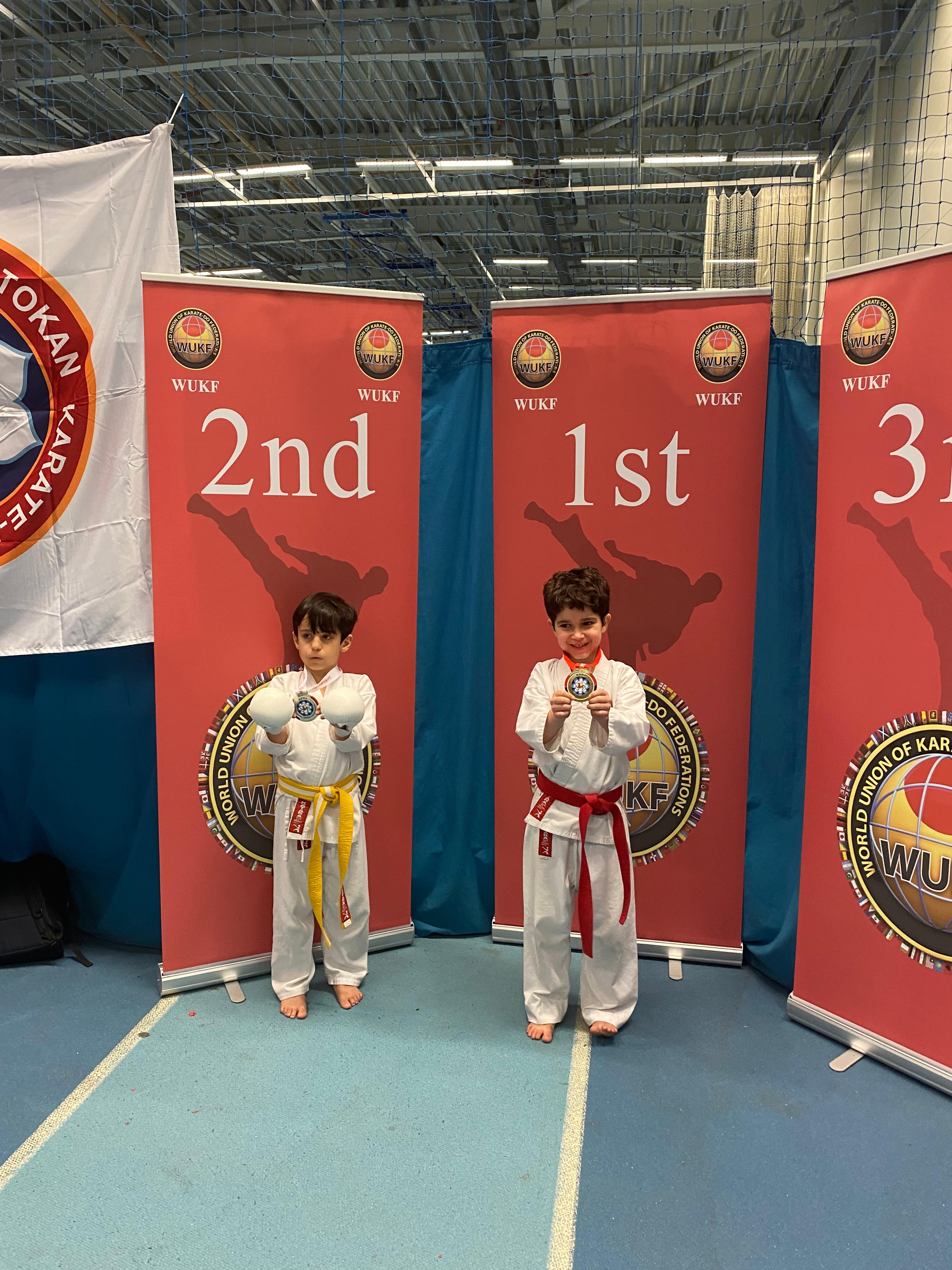 AN Shotokan Karate grading day ceremony with students receiving belts