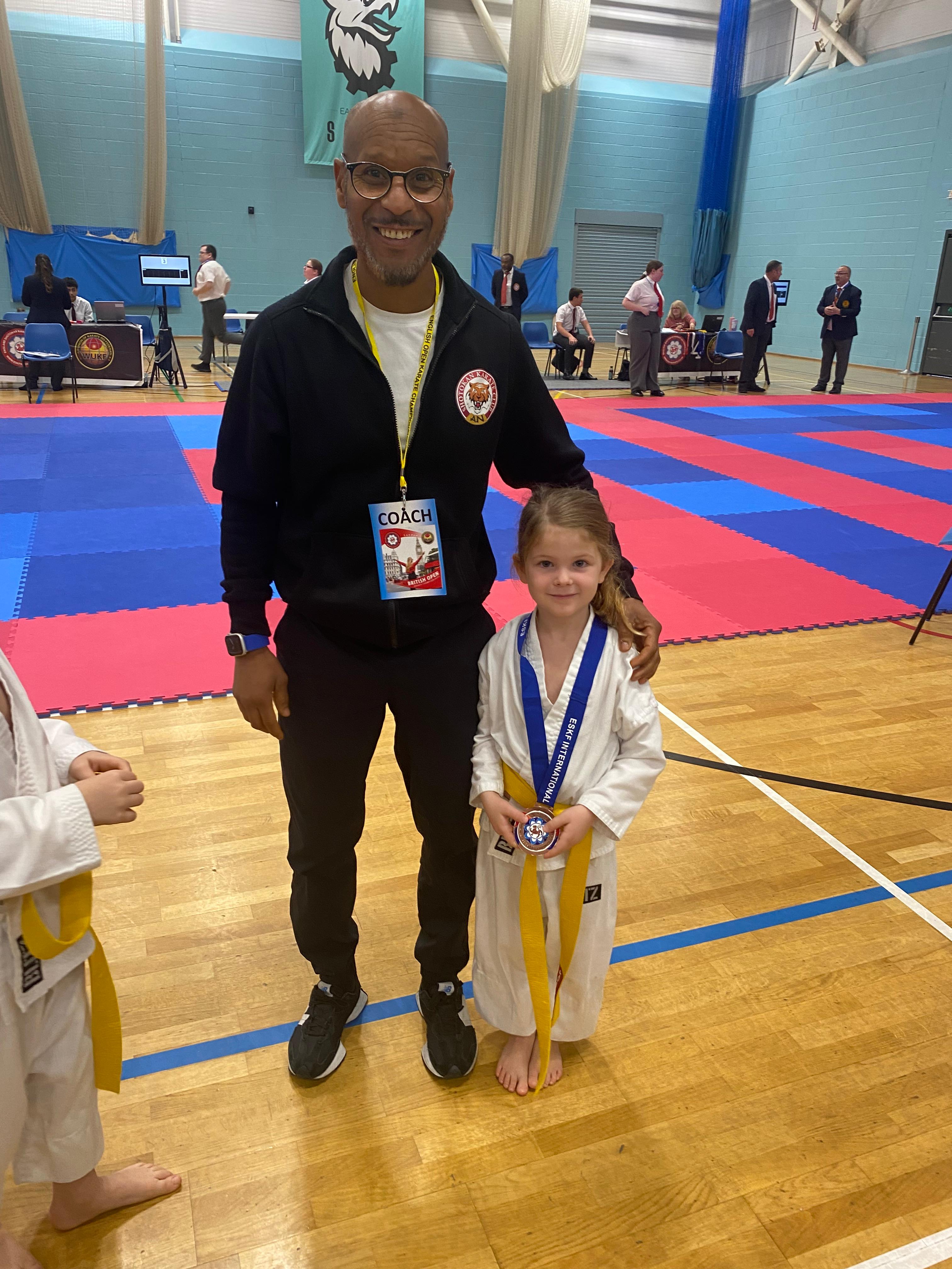 AN Shotokan Karate grading day ceremony with students receiving belts
